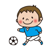 サッカーでドリブルする子供（男の子）