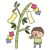 七夕飾りを飾る子供（男の子）