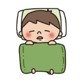 布団で眠る子供（男の子2）