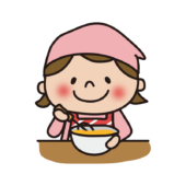 エプロンと三角巾をしてボールで卵を混ぜる子供（女の子1）