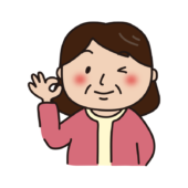 OKサインを出しているピンクのカーディガンを着たおばさん