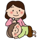 お母さんに耳かきをしてもらう子供（男の子）