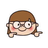 横を指さす眼鏡の女の子