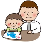 お絵描きをする息子と見守るパパ