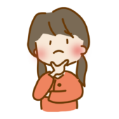 顎に手を当てて考える二つ結びのゆるくて可愛い女の子