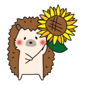 ヒマワリを持っているハリネズミ