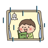 雨の日に家で読書をする子供（男の子）
