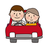 赤い車でドライブする夫婦（正面）