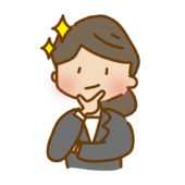 顎に手を当ててドヤ顔のゆるくて可愛いスーツの女性