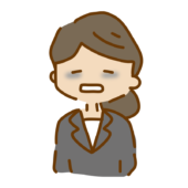 目の下にクマができているゆるくて可愛いスーツの女性