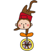 サーカスで一輪車に乗る猿