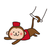 サーカスで空中ブランコをする猿