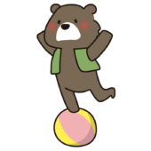 サーカスでボールに乗るクマ