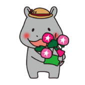 朝顔を持っているカバ