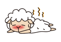 暑くてダウンしている羊