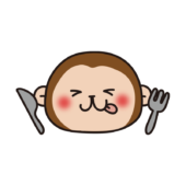 フォークとナイフを持っている猿