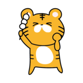 お団子を持っているトラ