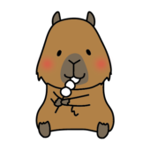 お団子を持っているカピバラ