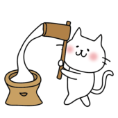 餅つきをする白い猫