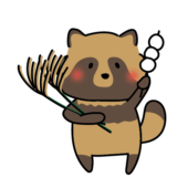 ススキとお団子を持っているタヌキ