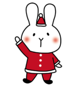 サンタの衣装を着た白いうさぎ