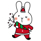 クリスマスパーティーでクラッカーを鳴らす白いうさぎ