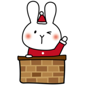 クリスマスに煙突から顔を出す白いうさぎ