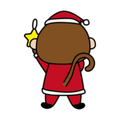 サンタの衣装でクリスマスの飾りつけをする猿