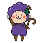 葡萄のかぶり物をしている猿