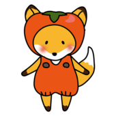 柿のかぶり物をしているキツネ