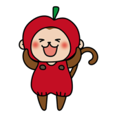 林檎のかぶり物をしている猿