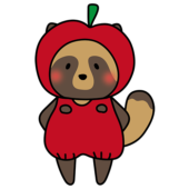 林檎のかぶり物をしているタヌキ