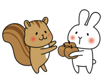 リスに果物を渡す白いうさぎ