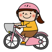 ヘルメットをかぶって自転車に乗る子供（女の子）