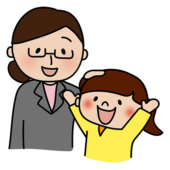 女の子の頭を撫でて褒める眼鏡をかけた女性教師
