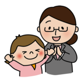 女の子を褒める眼鏡をかけた女性教師