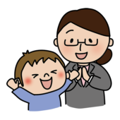 男の子を褒める眼鏡をかけた女性教師