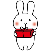 プレゼントを渡す白いうさぎ