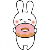 ドーナツを食べる白いうさぎ