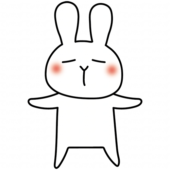 幸せそうに両手を広げる白いうさぎ