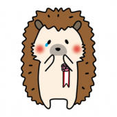 胸にコサージュを付けて泣いているハリネズミ