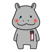 胸にコサージュを付けて泣いているカバ