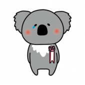 胸にコサージュを付けて泣いているコアラ