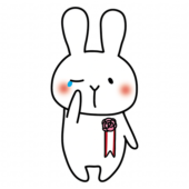 胸にコサージュを付けて泣いている白いうさぎ