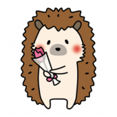 一輪の花を持っているハリネズミ