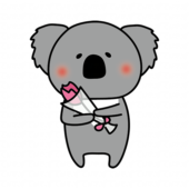 一輪の花を持っているコアラ