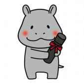 卒業証書を持っているカバ