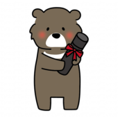 卒業証書を持っているクマ