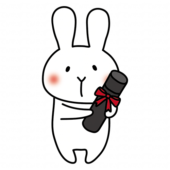卒業証書を持っている白いうさぎ