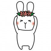 頭に花冠をつけた白いうさぎ